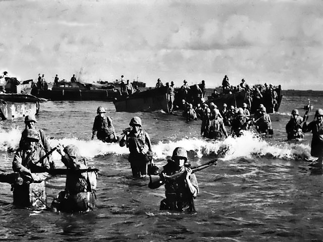 Marines wading ashore on Tinian